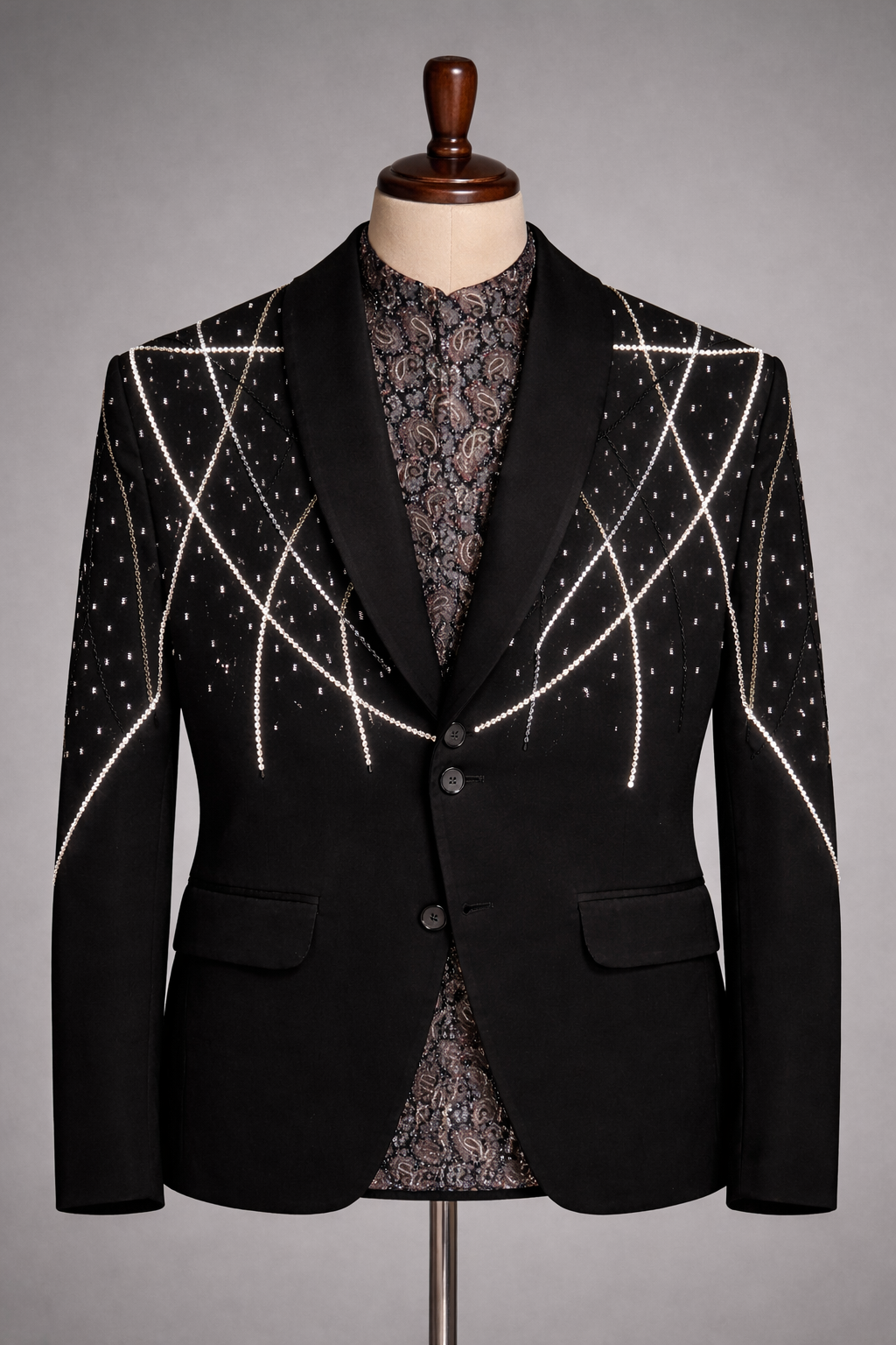 Elegant black blazer with embellished details